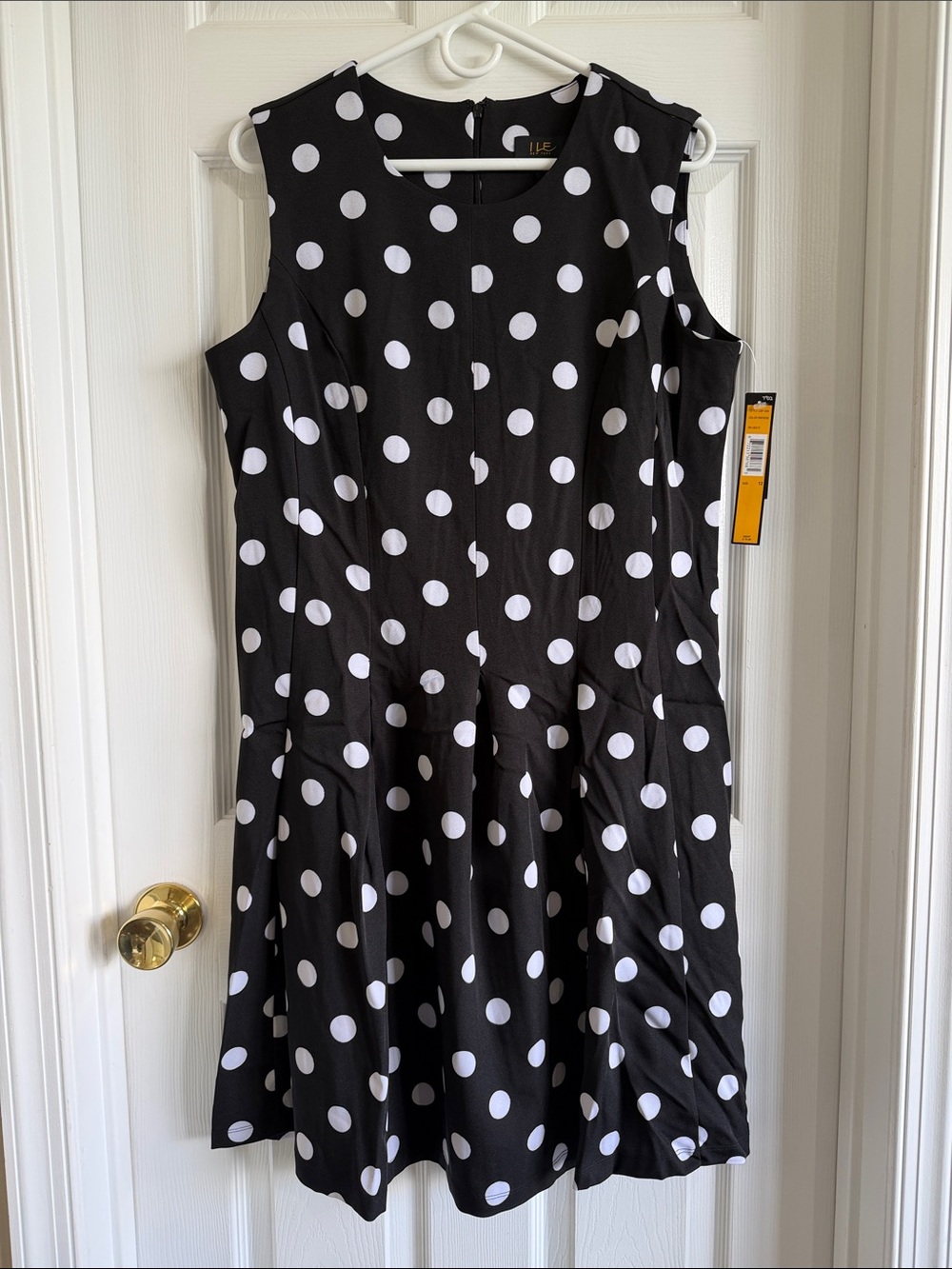 NWT Sleeveless Black and White Polka Dot Mini Dress
